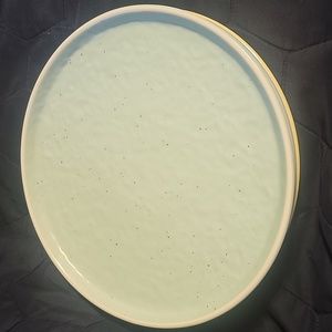 Stone +Lain  four 11-inch  dinner plates.